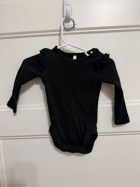 Rylee + Cru Black Ribbed Long-Sleeve Baby One-Piece with Ruffled Shoulders